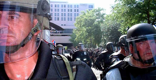 Around 100 fully-geared riot added their ranks to other officers, all to confront about 65 protesers.